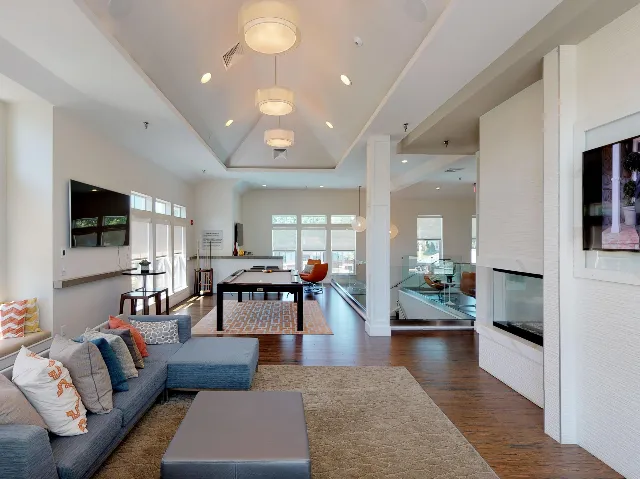 Resident lounge with couch seating and TV