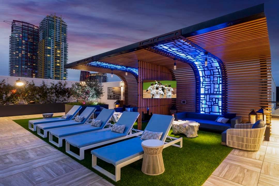 Cabana areas with lounge seating, shade structures, couch seating and outdoor TVs