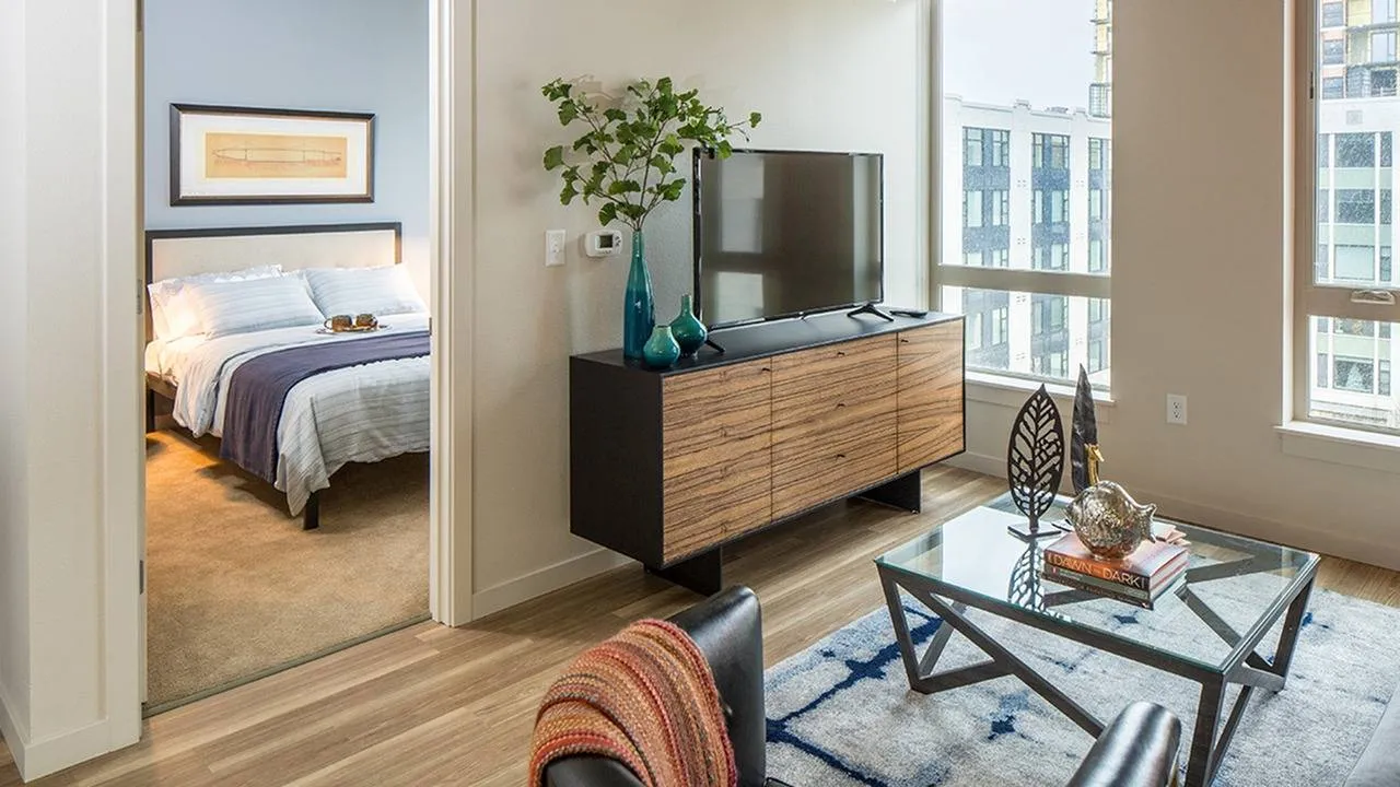 Large bedroom with plush carpeting