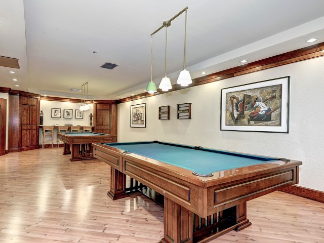 Game room image with pool table