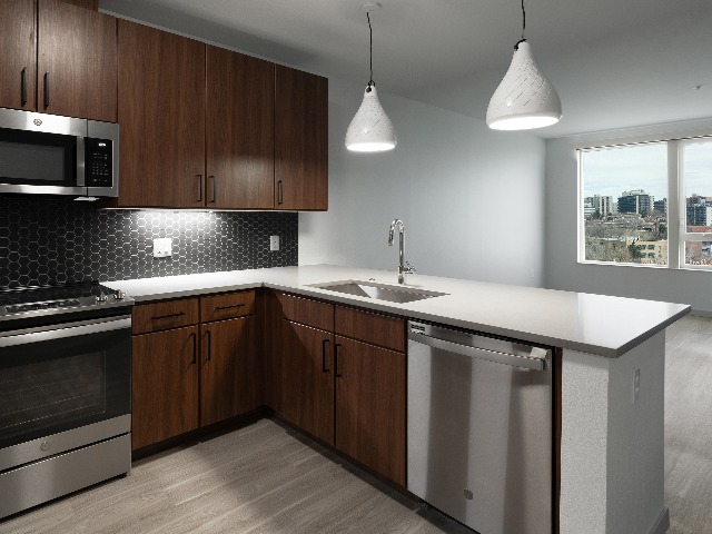 Modera West Wash Park Kitchen and Living Room with a window