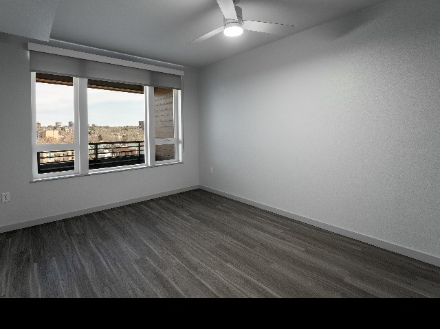 Hardwood-inspired plank-style flooring shown in bedroom