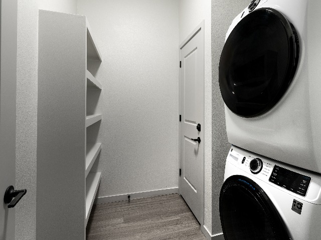 Full-sized front-loading washer and dryer shown in laundry area