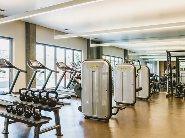 Blossom Plaza | Expansive fitness center with state of the art equipment