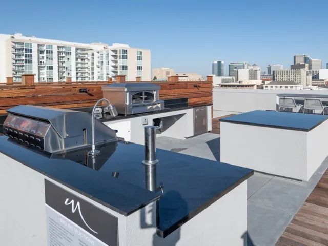 Rooftop lounge with outdoor pizza kitchen