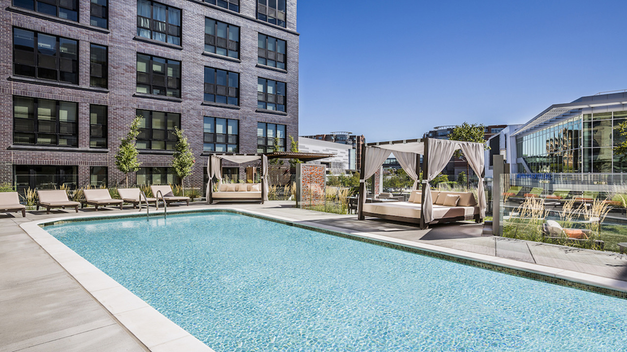 Resort-Style Pool and Sundeck with Cabanas