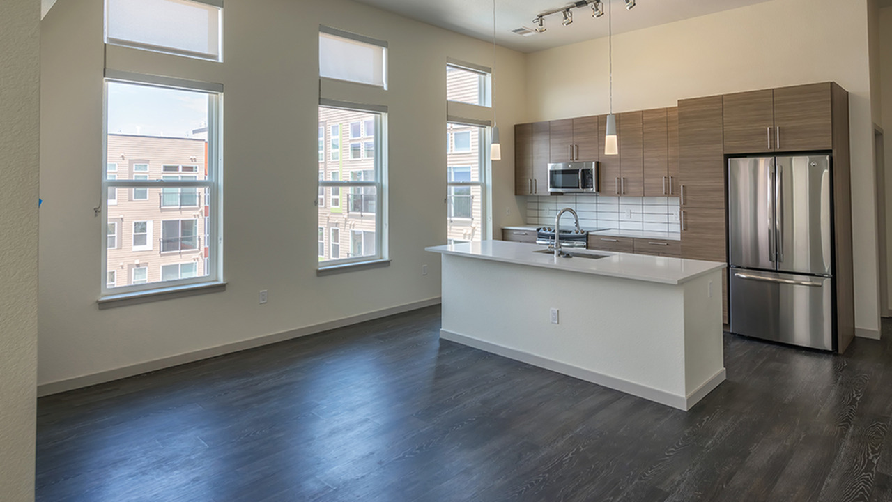 Oversized Windows in Kitchen Allows for Natural Light