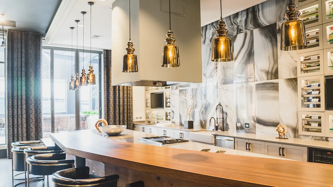 Well Appointed Resident Lounge with Demonstration Kitchen and Bar Seating