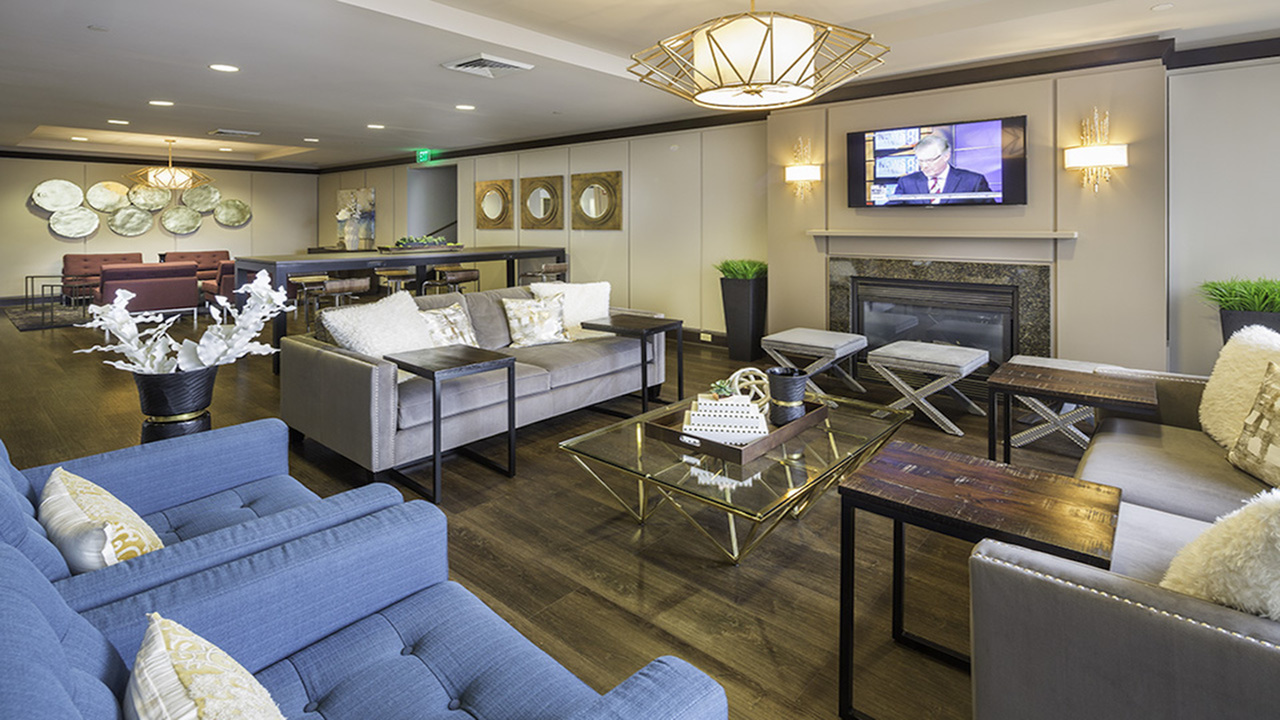 Resident lounge with access to TV and flexible work space