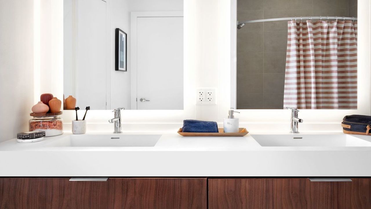 Dual Vanity with Quartz Counter-tops and Back-lit Mirrors
