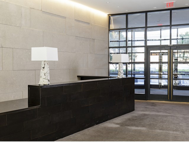 Concierge Location with Large Desk and Floor to Ceiling Windows