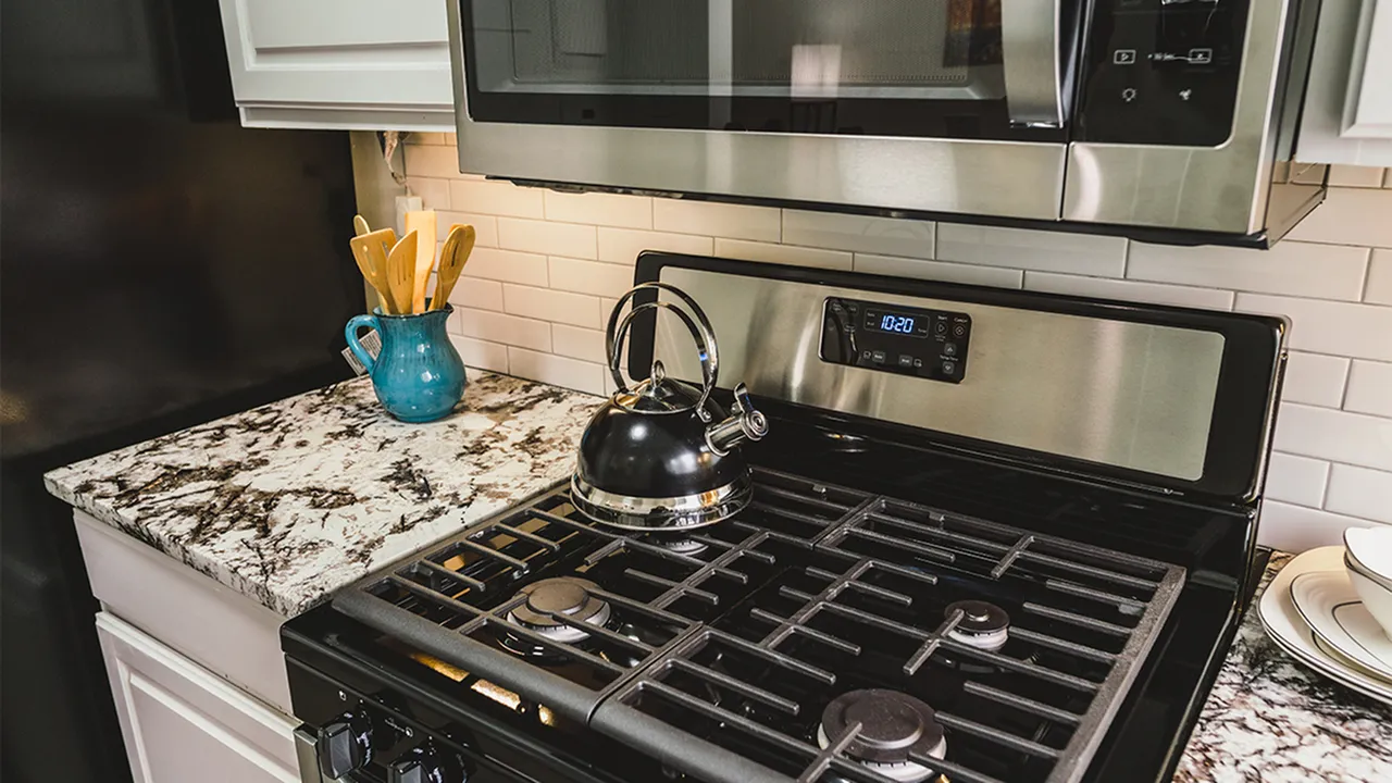 New gas range and microwave in upgraded homes