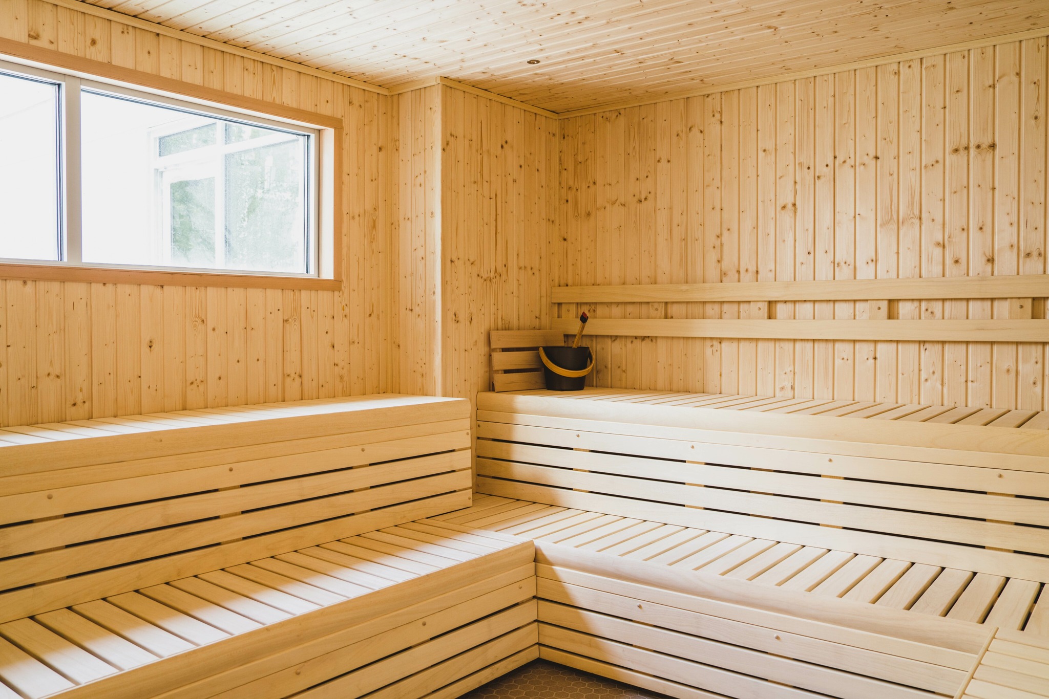 wooden sauna with window at modera germantown apartment homes for rent in nashville tennessee