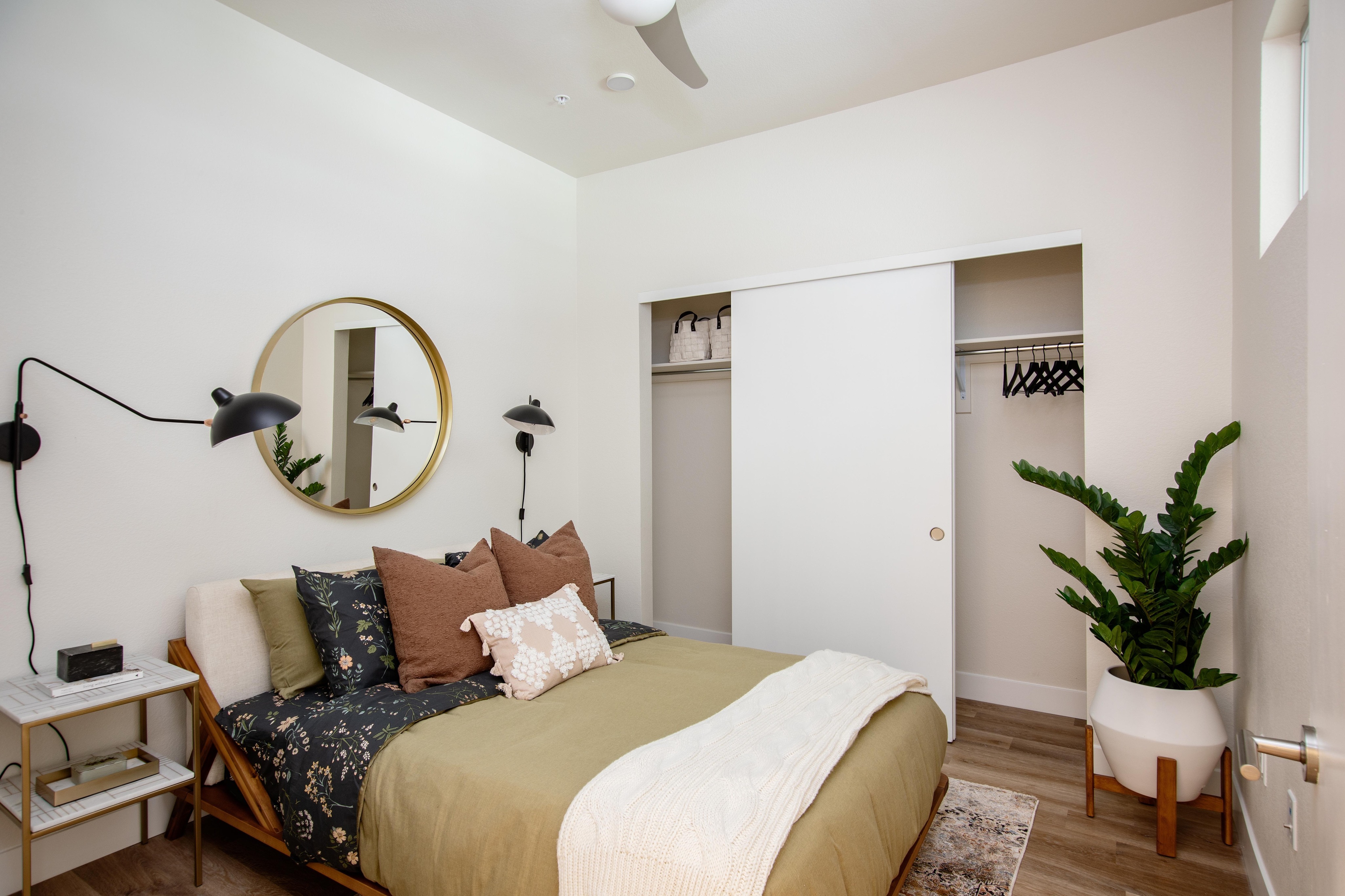 bedroom with furniture at modera art park apartment homes for rent in denver colorado