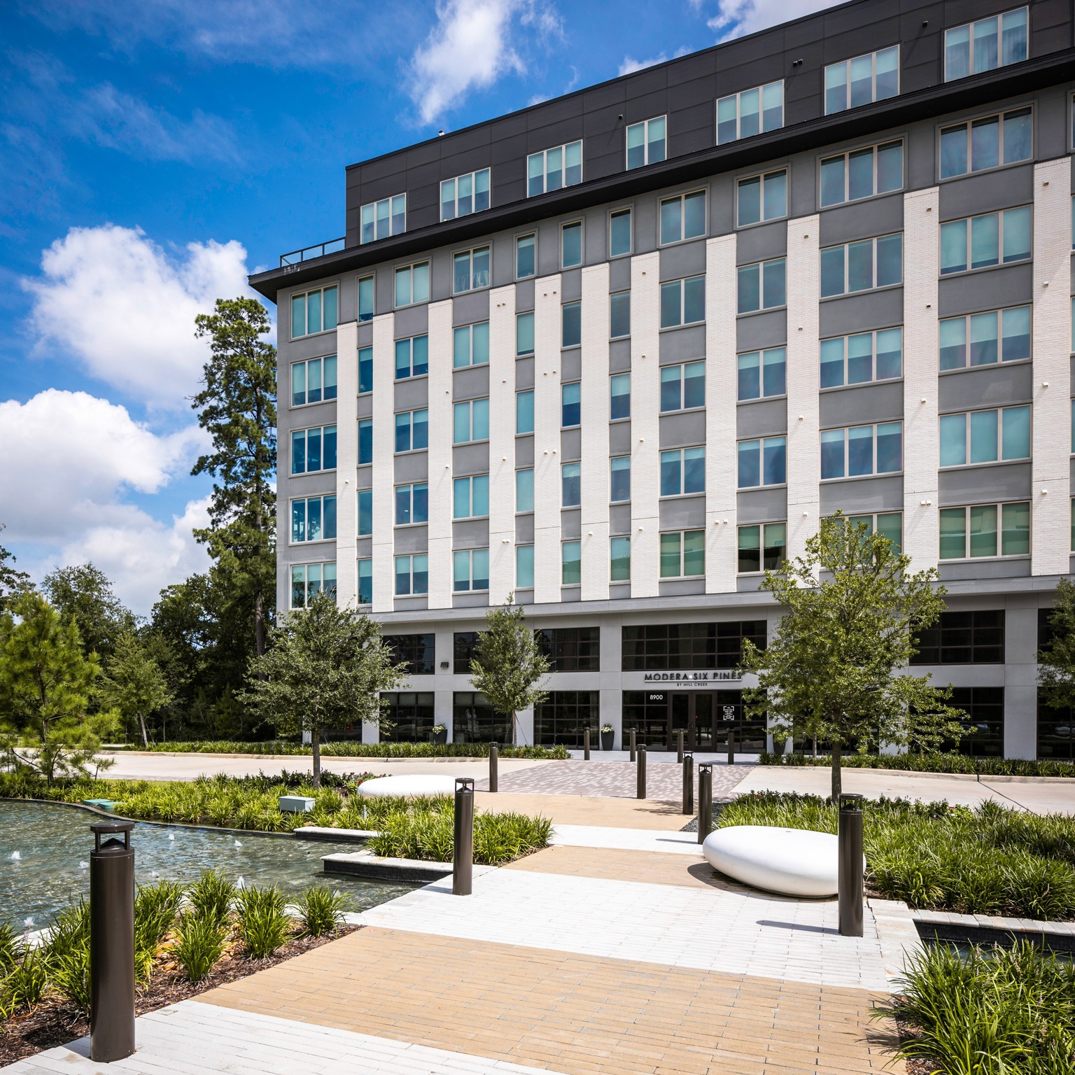 Located adjacent to The Woodland Town Center, offering quick access to retail, dining, hotel, and entertainment space