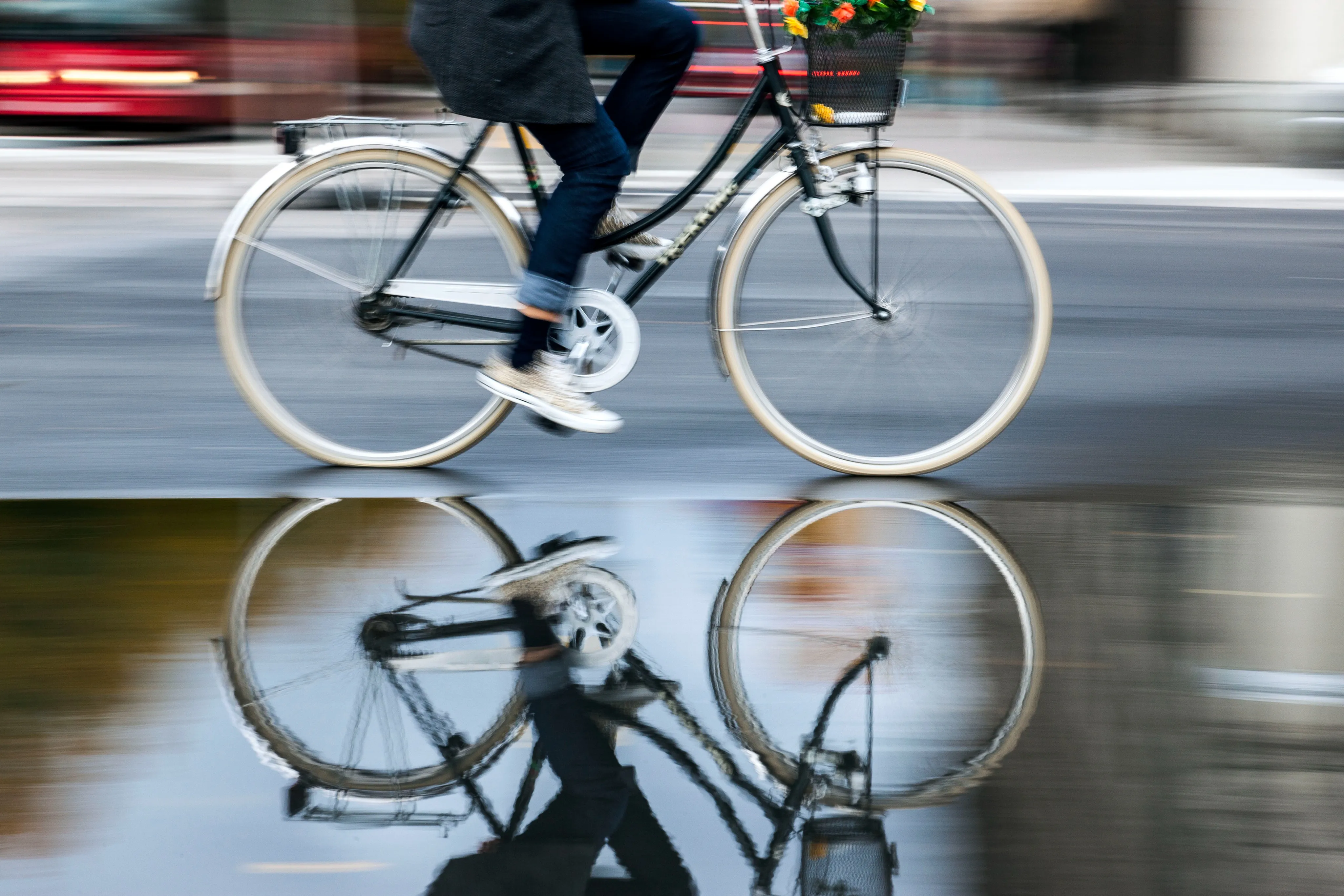 person riding bike outside on street modera garden oaks apartment homes for rent in houton tx