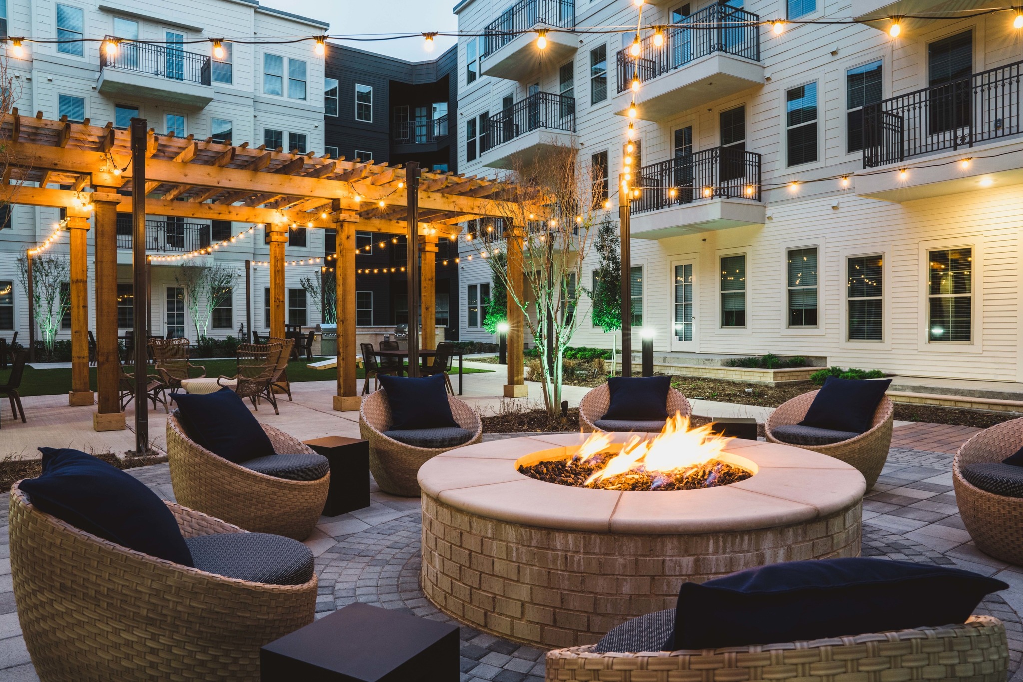 outdoor firepit in courtyard modera frisco square apartment homes for rent in tx