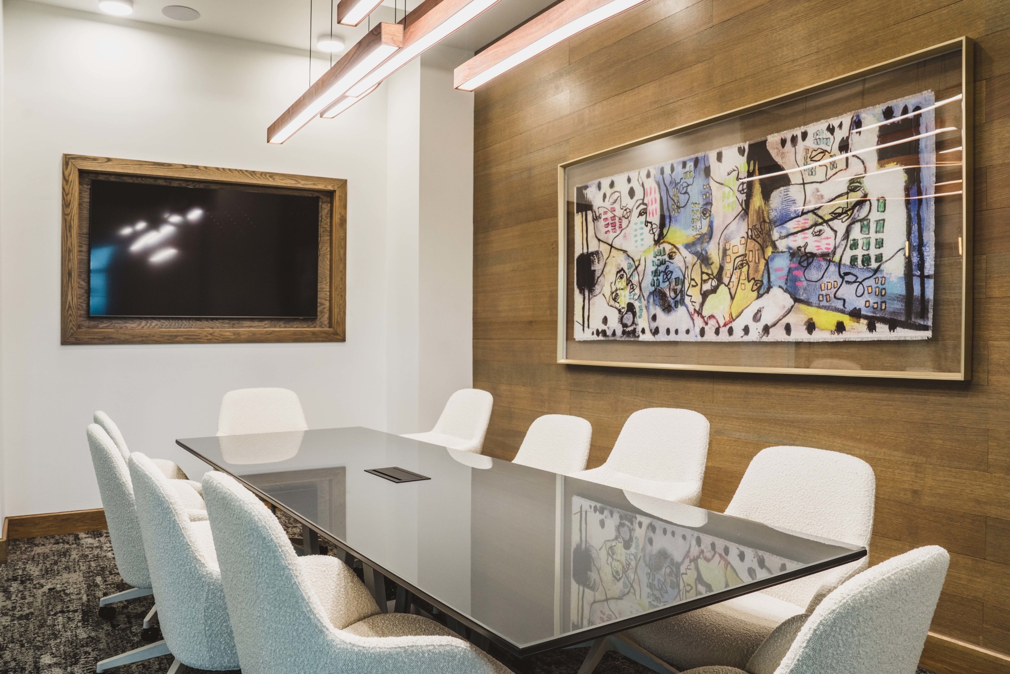 conference room with tv and table modera frisco square apartment homes for rent in tx