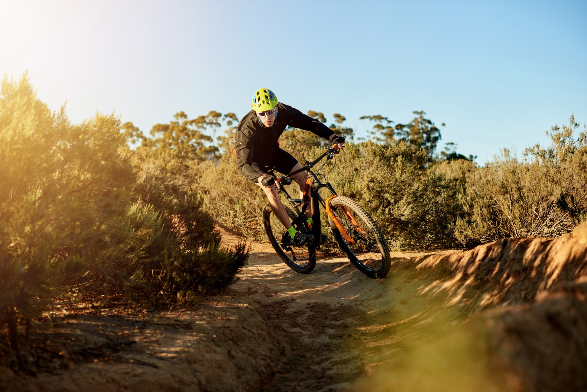 person biking on trail modera mckinney ridge apartment homes for rent in tx