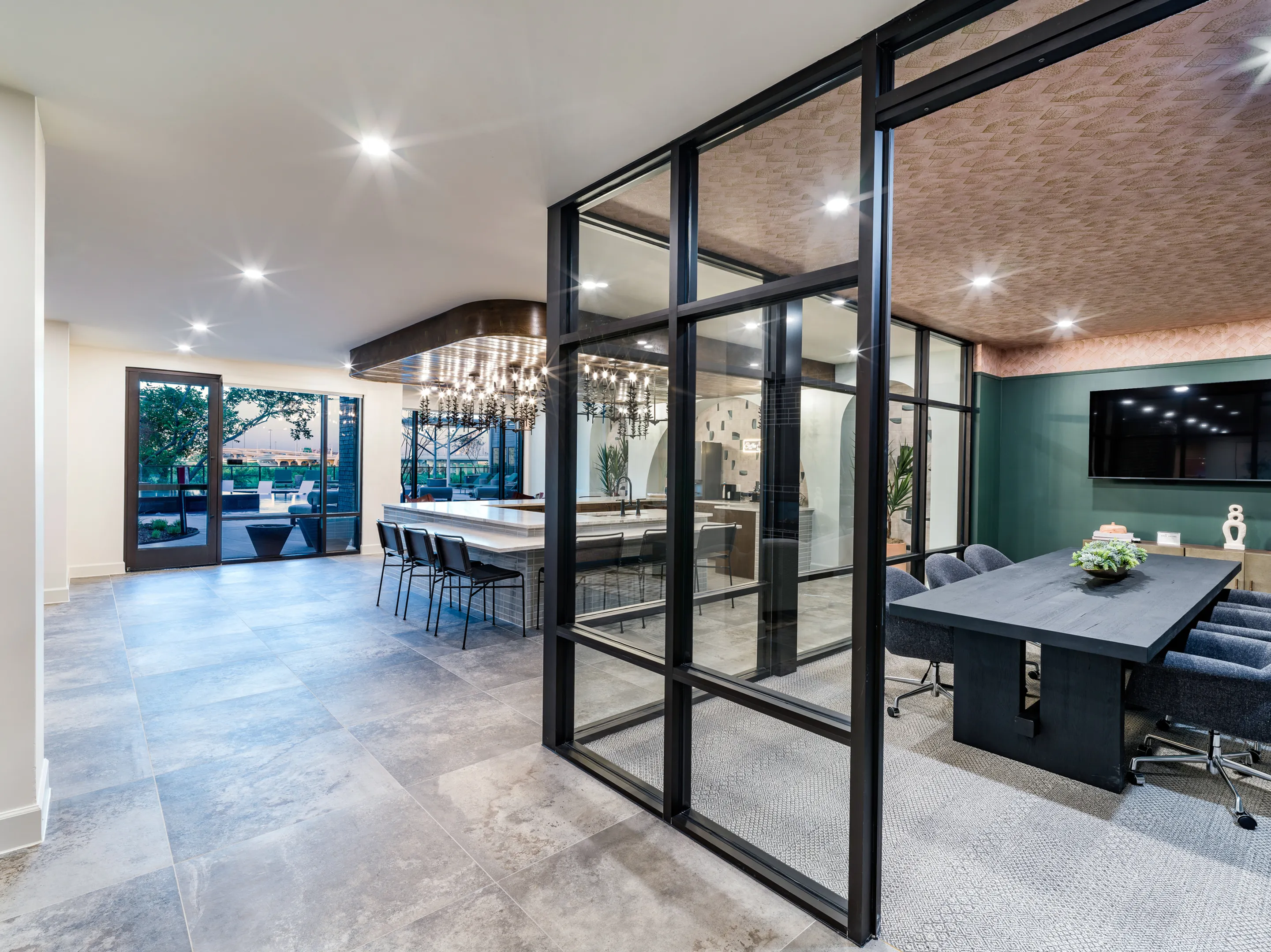 modera trinity apartments clubroom with chef kitchen and private conference room
