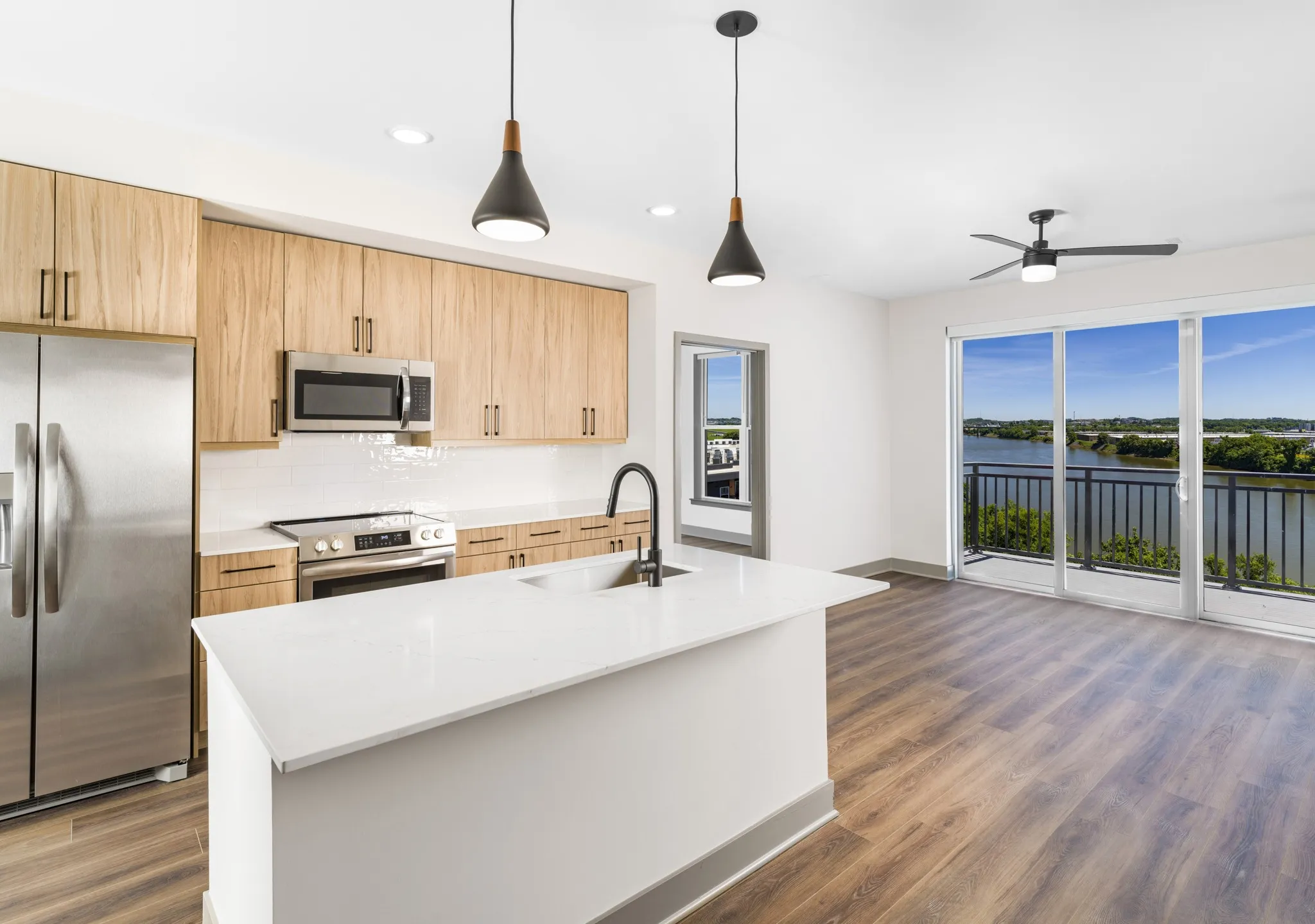 large kitchen with island and stainless steel appliances modera riverview apartment homes for rent in nashville tn
