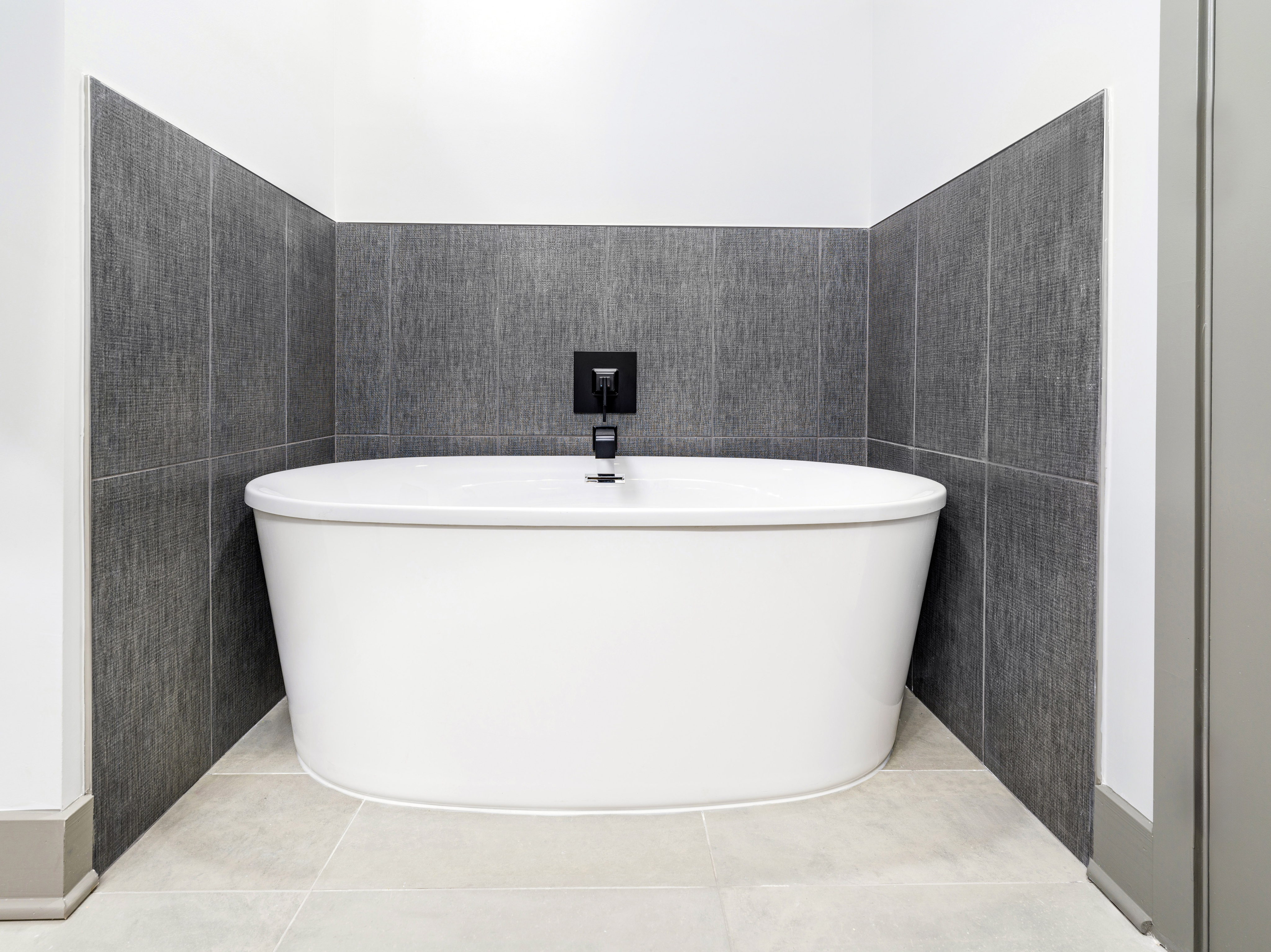 large bathtub next to dark tiles modera riverview apartment homes for rent in nashville tn