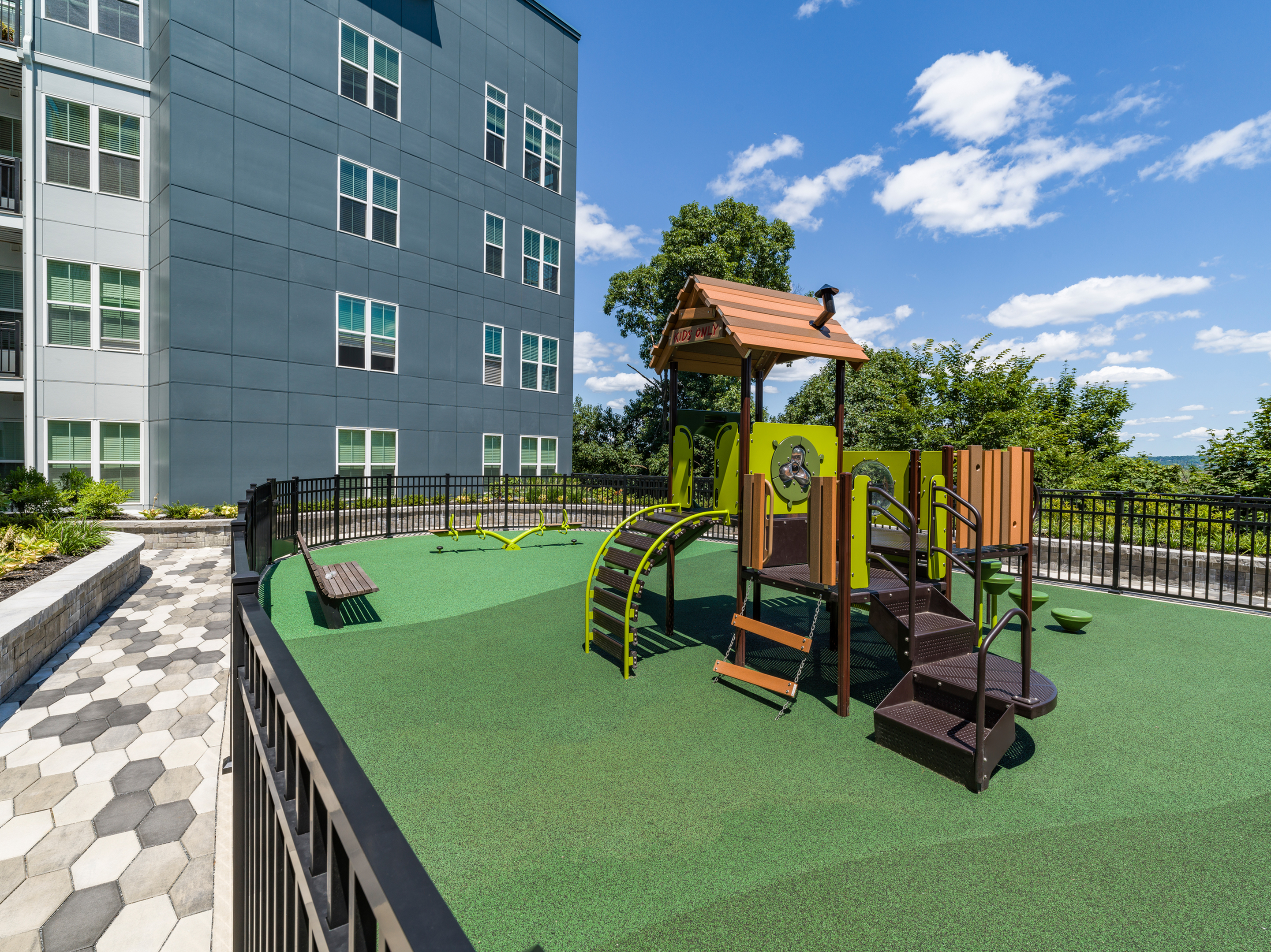 outdoor playground amenity space modera montville apartment homes for rent in new jersey