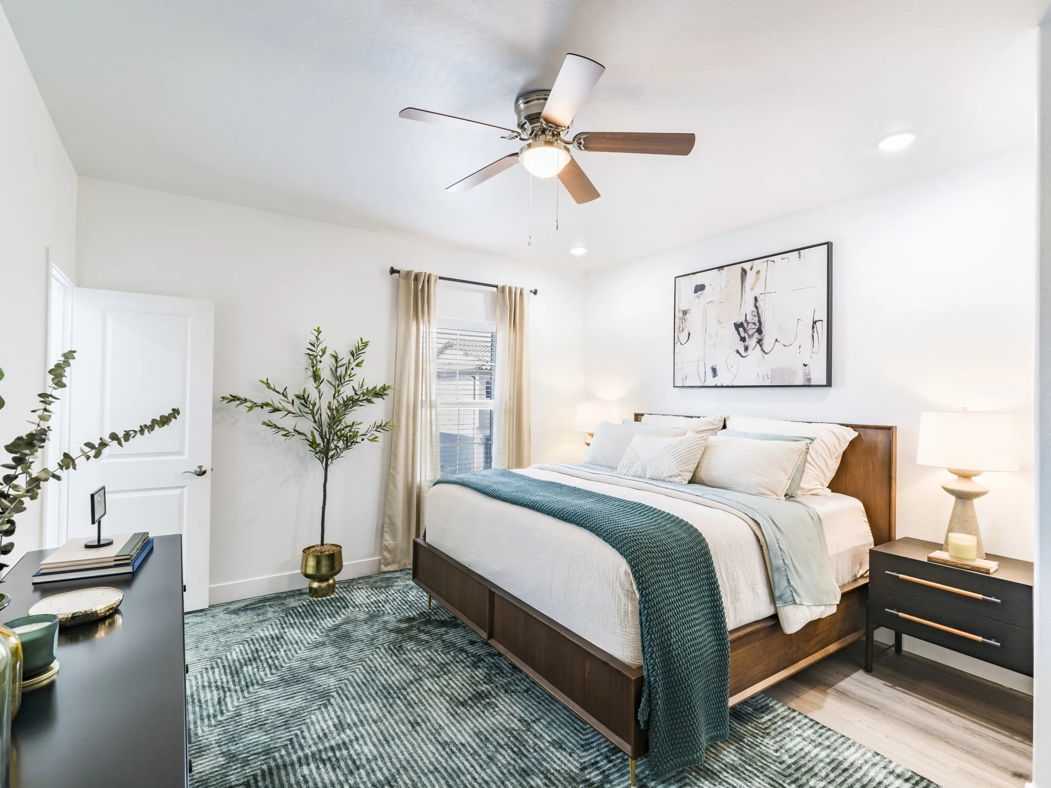 Bedroom with bed and oversized window at Amavi Aster Ridge in Phoenix, AZ