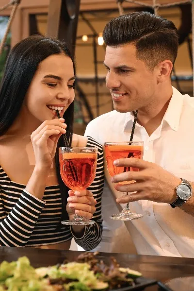 Couple having drinks together