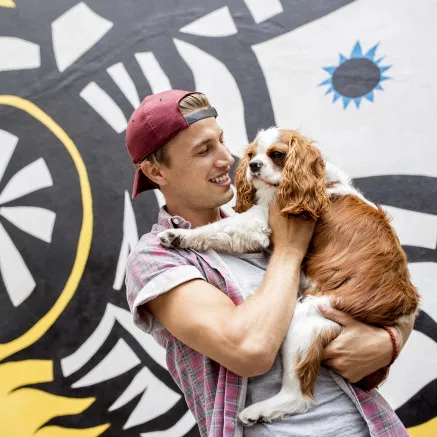 Image of dog and owners