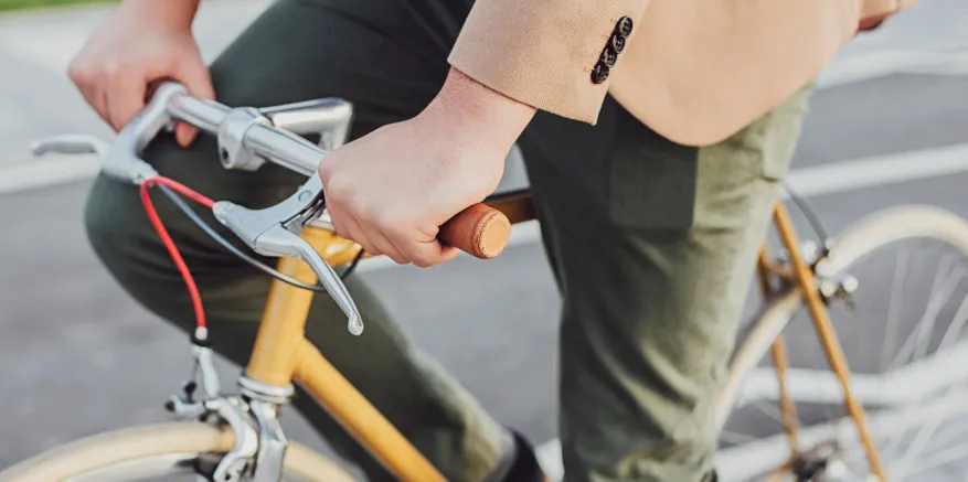 Image of man riding bicycle to work