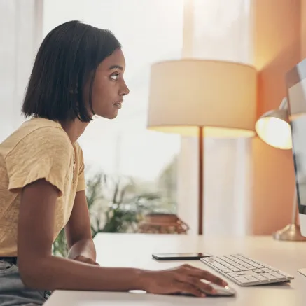 Image of woman working at computer