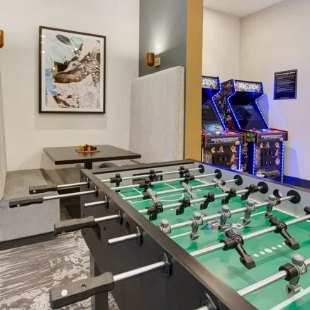 foosball table and arcade games at modera berkeley heights apartments new jersey