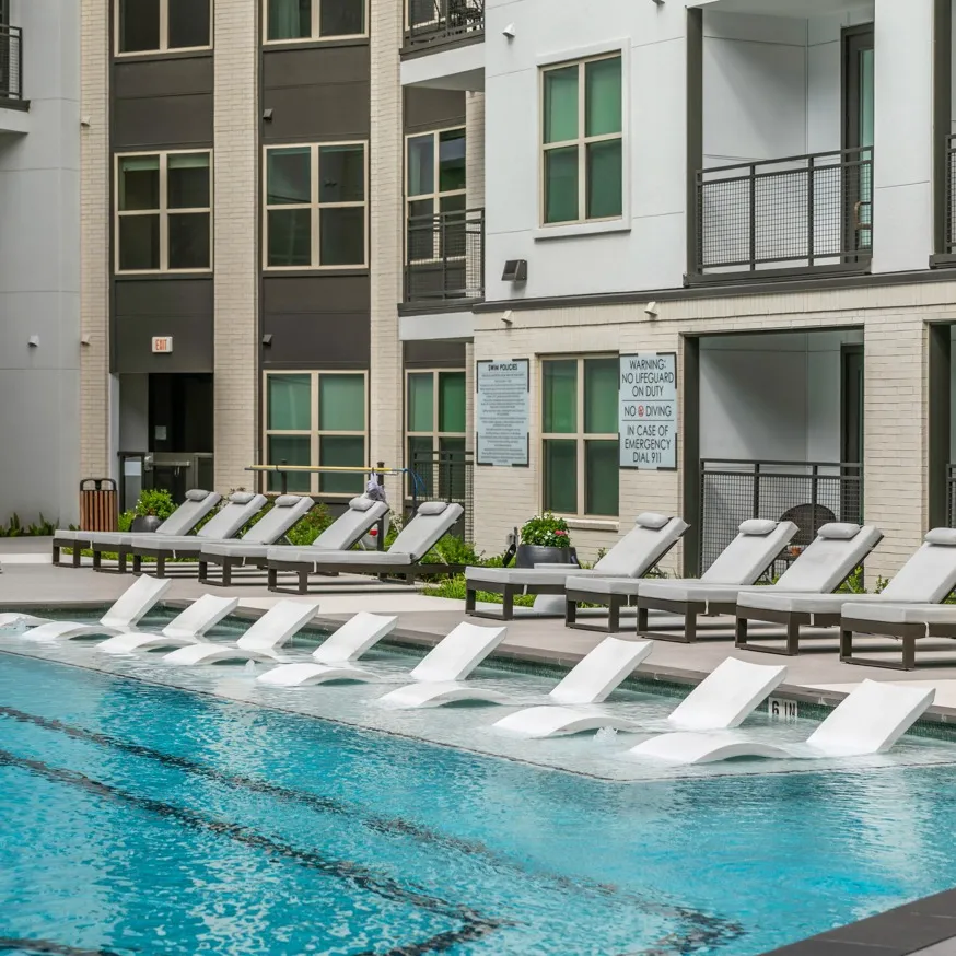 sunledge lounge seating at swimming pool modera six pines apartment homes for rent in texas