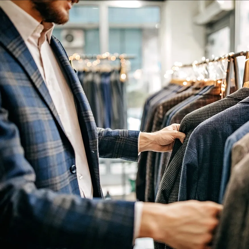 man shopping for suit jackets modera lofts apartment homes for rent
