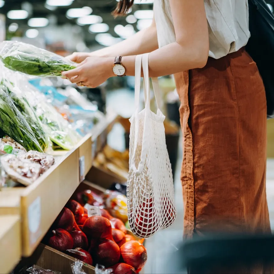 woman shopping in market at modera trinity dallas apartment homes for rent in texas