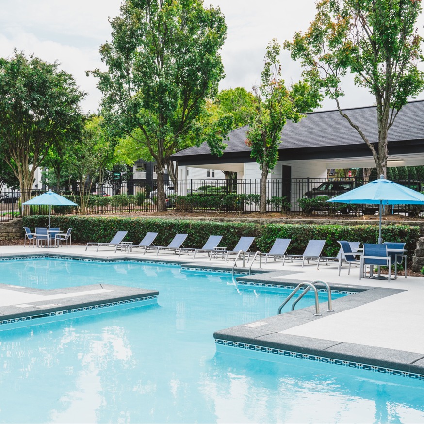 Alister Lake Lynn apartments in Raleigh luxurious swimming pool area with adjoining tennis courts