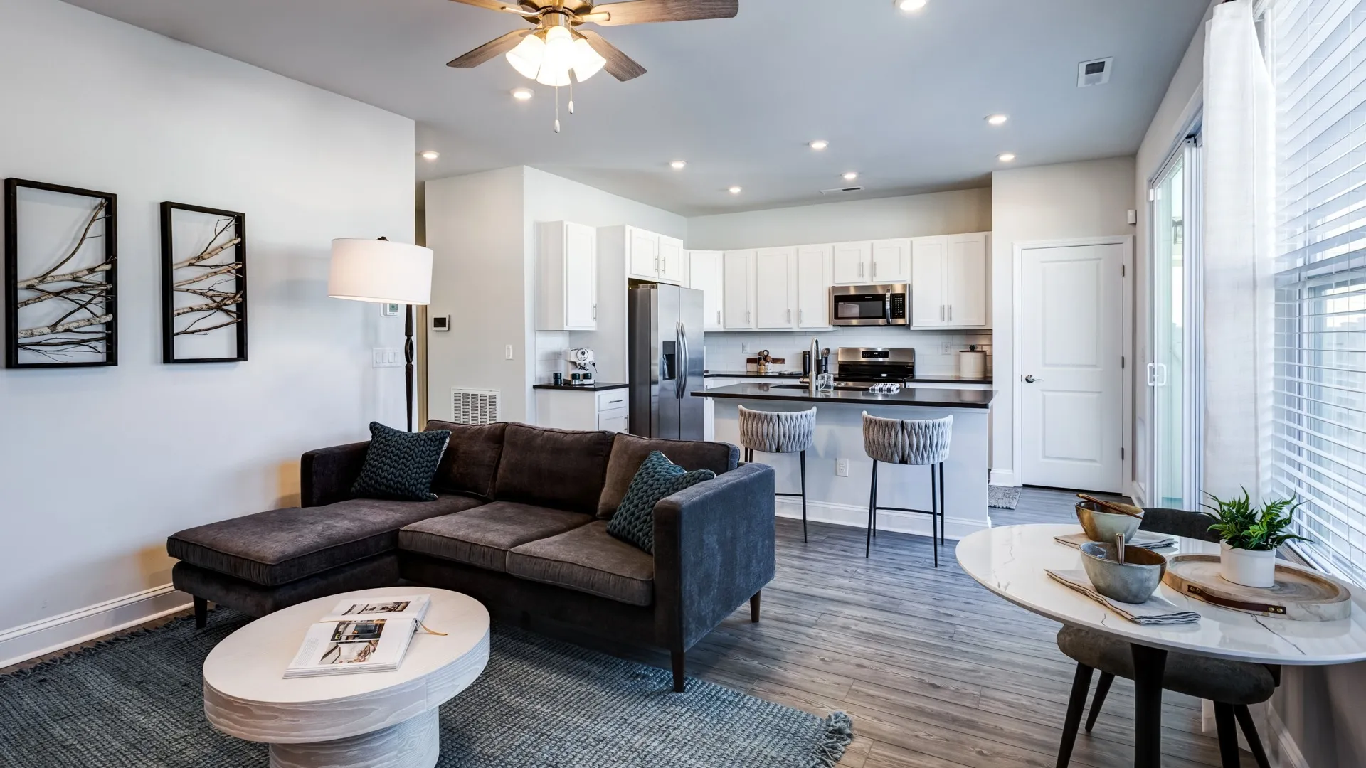 Amavi Sherrills Ford model home with spacious layout of living room and kitchen