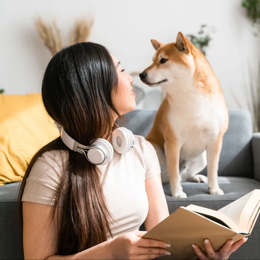 woman with dog in apartment home modera riverview for rent in tn