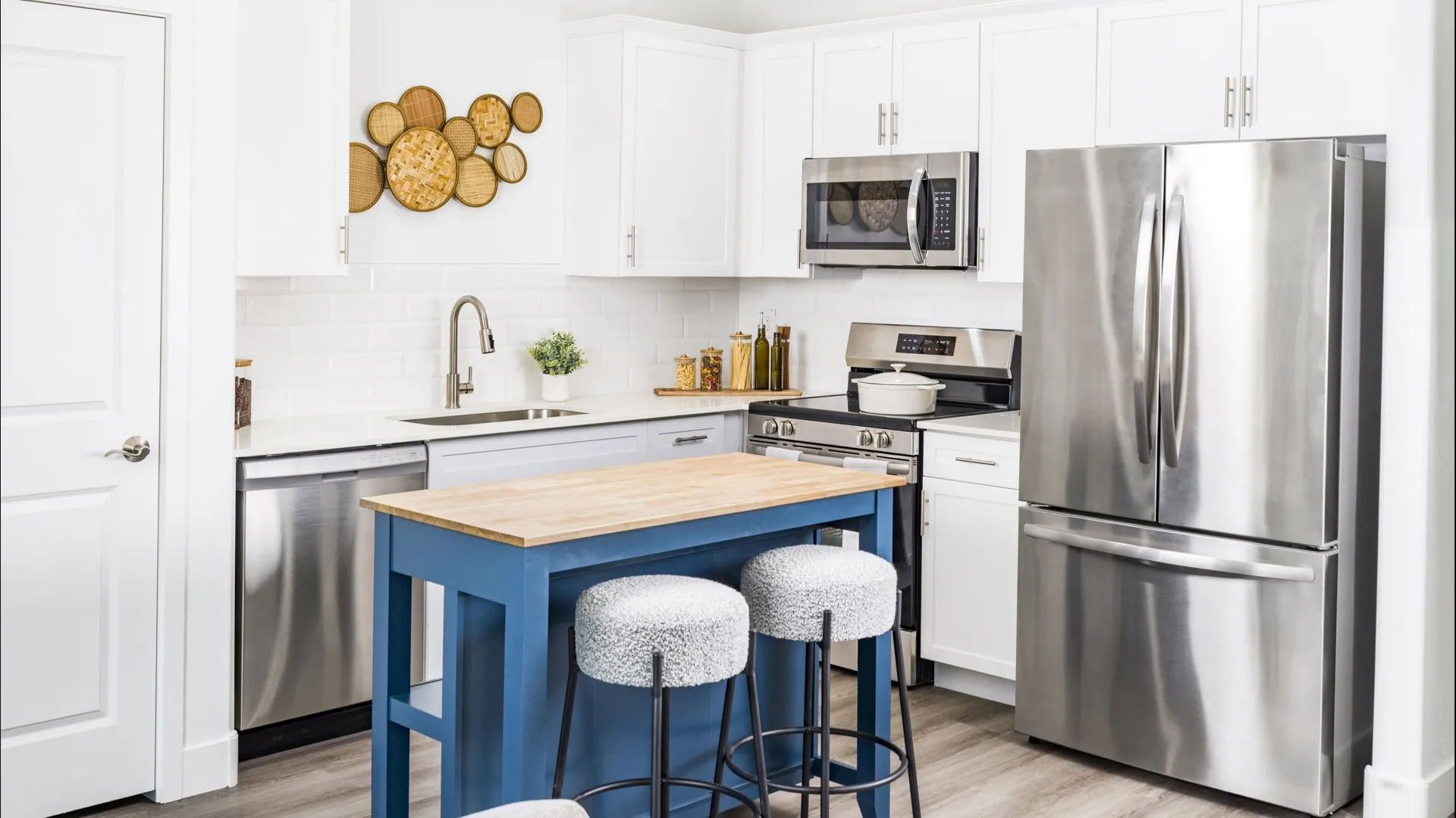 kitchen with white cabinetry and stainless steel appliances amavi aster ridge single family homes for rent in phoenix az