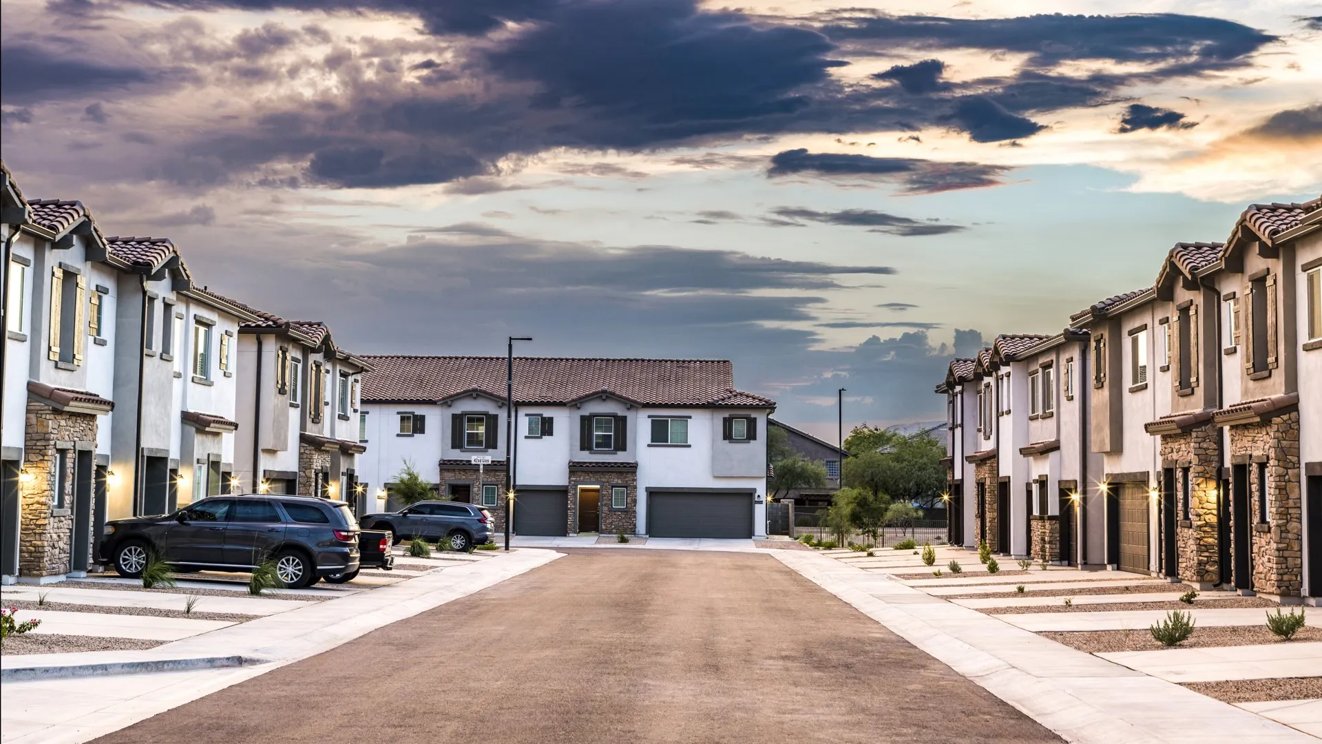 exterior streetview of townhomes in neighborhood with driveways amavi aster ridge single family homes for rent in phoenix az