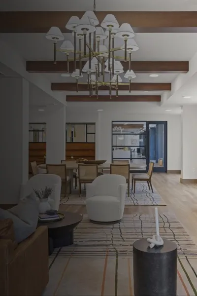 resident clubroom with hdtv above fireplace and seating modera newton apartment homes for rent in ma