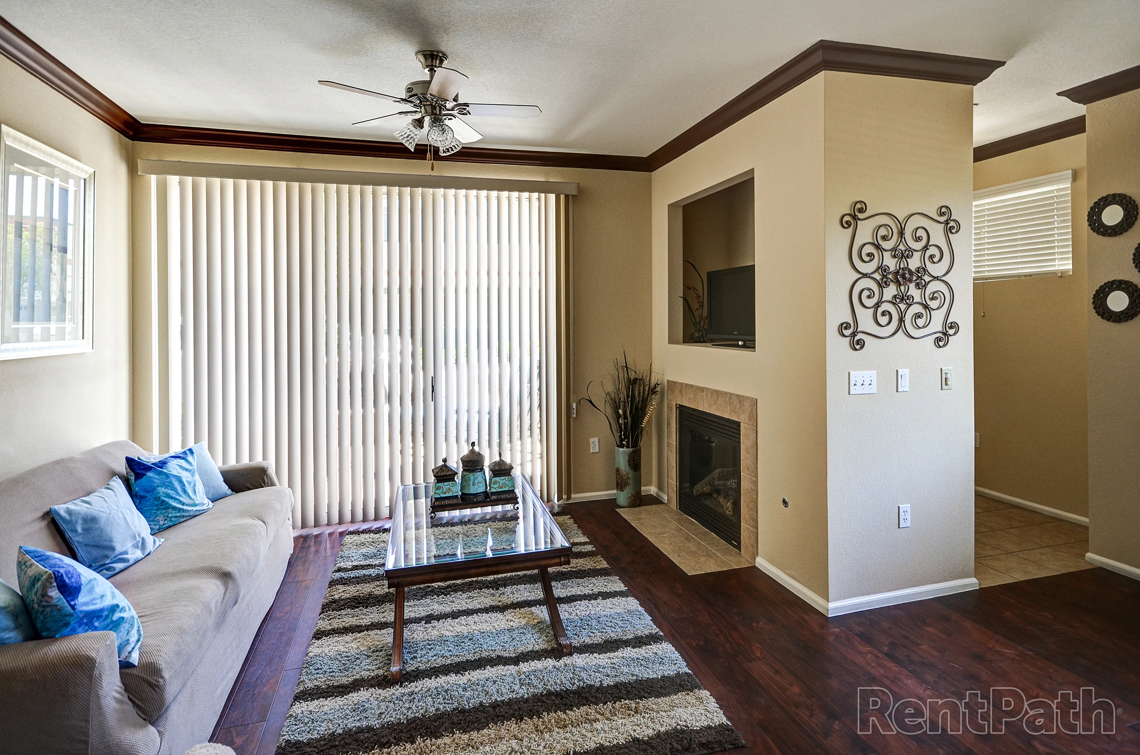 Furnished apartment living area shown — representative home at 9920 Apartments.