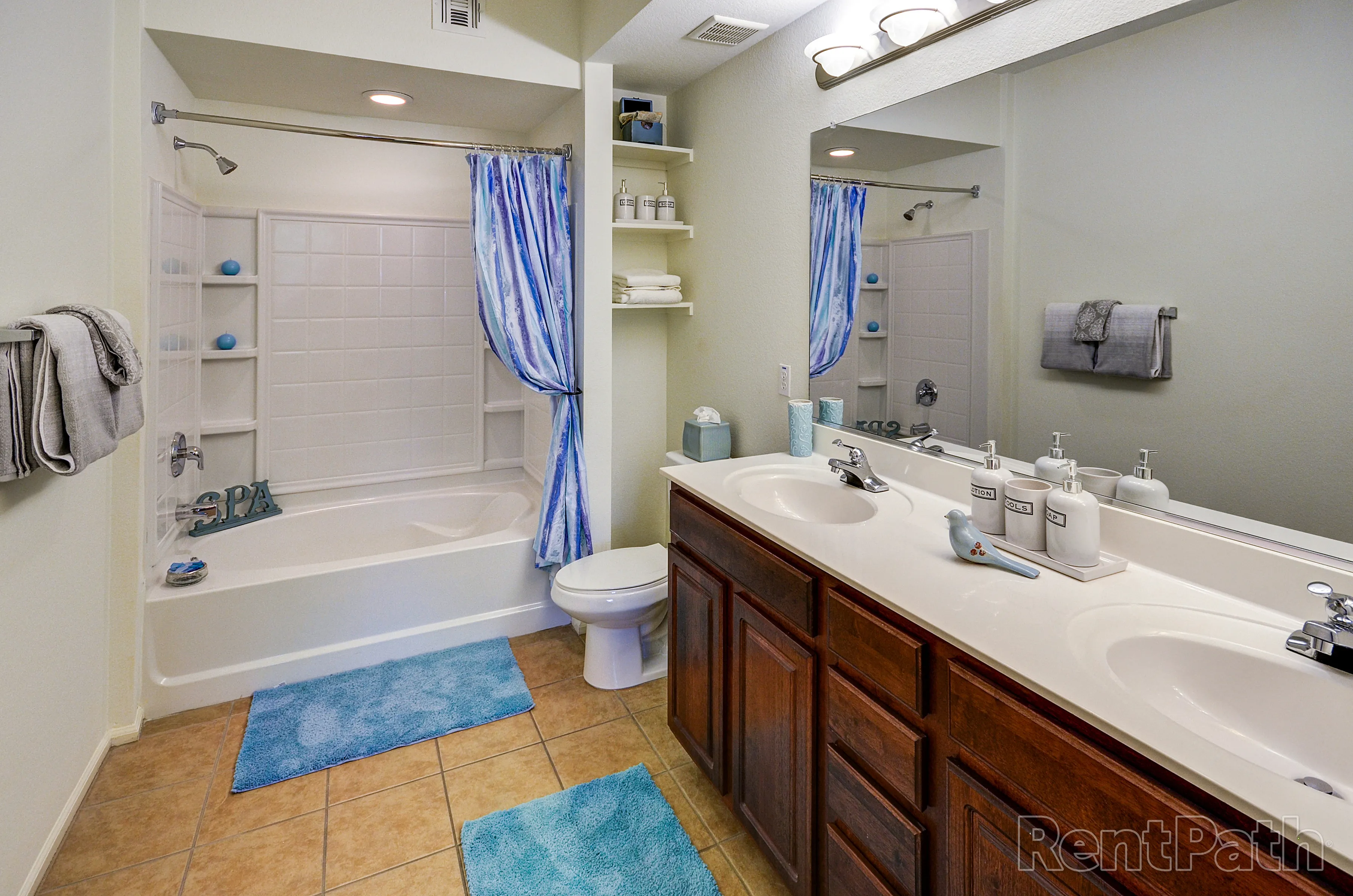 Apartment bathroom — representative home at 9920 Apartments.