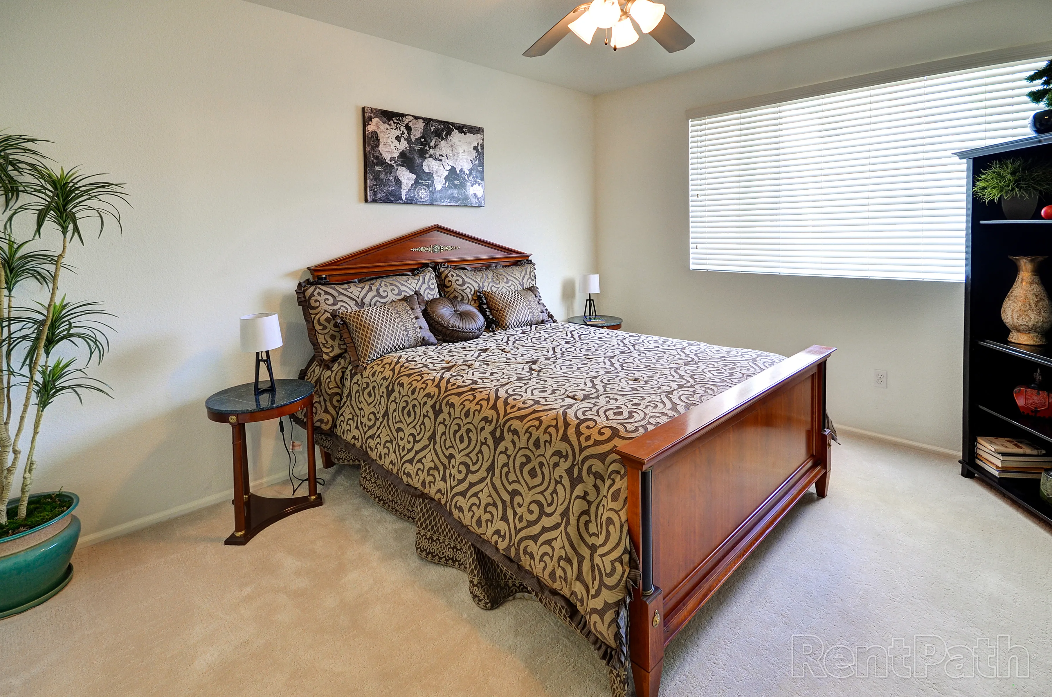 Furnished bedroom shown — representative home at 9920 Apartments.