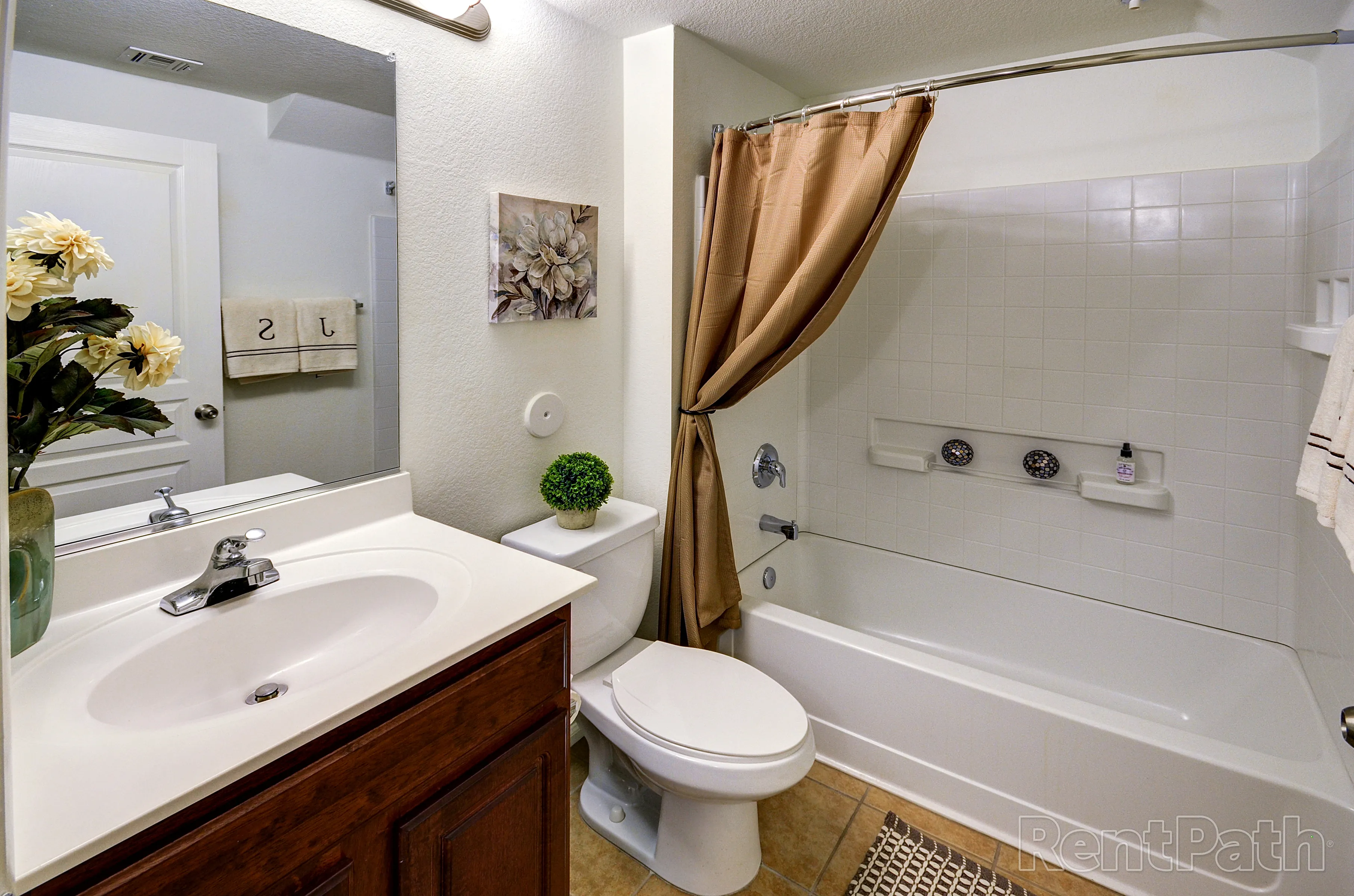 Apartment bathroom — representative home at 9920 Apartments.