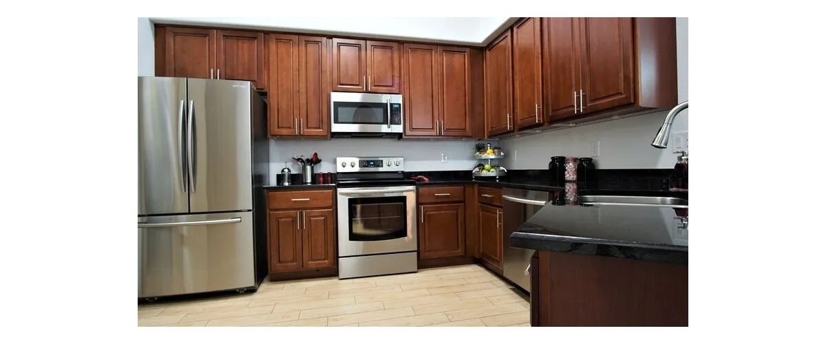 Apartment kitchen — representative home at 9920 Apartments.