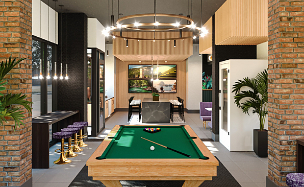 Chic and modern recreation room featuring a stylish billiard table, vibrant artwork, and elegant bar seating with luxurious lighting.