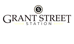 Elegant Grant Street logo featuring a circular emblem with a bold 'S' and sophisticated typography.