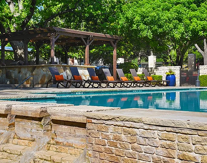 Saratoga Ridge Apartments in South Austin TX Tanning Deck and Pool Lounge